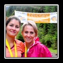 Two of the many winners at the finish of the half-marathon.